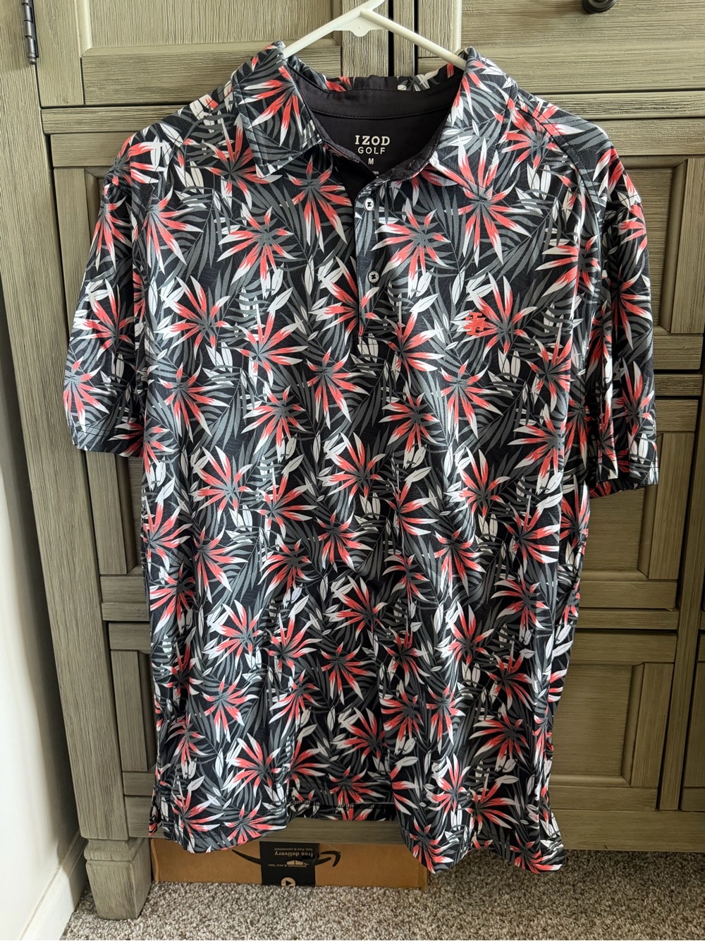 Izod Men’s Black Polo with Red & White Tropical Print